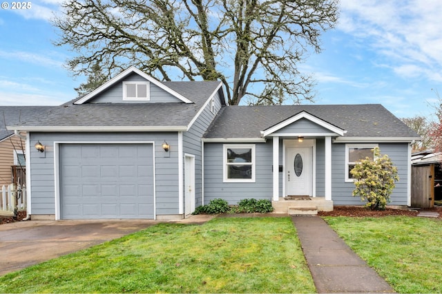 1262 Kalmia St, Junction City, OR 97448 - view of front of property featuring a garage, a shingled roof, a front yard, and concrete driveway