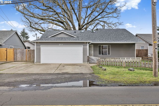 263 Ferndale Dr, Eugene, OR 97404 - view of front of property featuring driveway, an attached garage, and roof with shingles