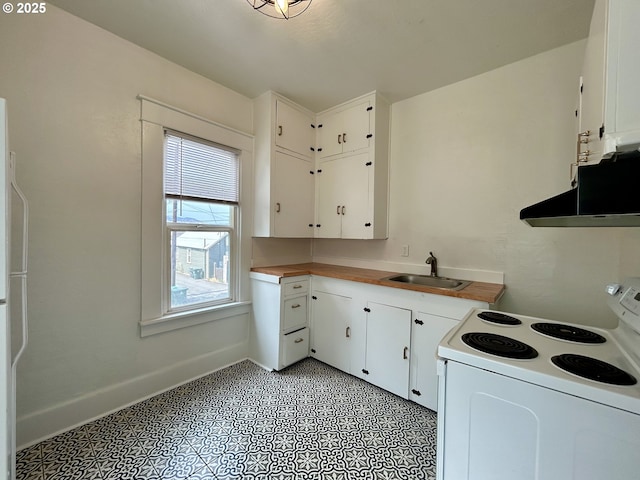 kitchen featuring under cabinet range hood, a sink, baseboards, white cabinets, and white range with electric cooktop