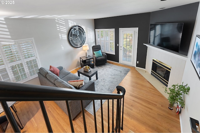 639 1st St, Lake Oswego, OR 97034 - living room with a fireplace with flush hearth and light wood-type flooring