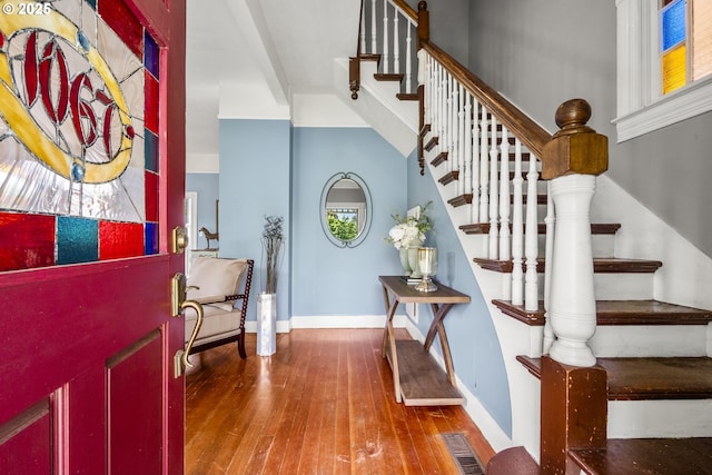 1067 Oak St, Silverton, OR 97381 - foyer featuring stairway, hardwood / wood-style flooring, and baseboards