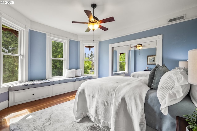 1067 Oak St, Silverton, OR 97381 - bedroom with wood finished floors and a ceiling fan