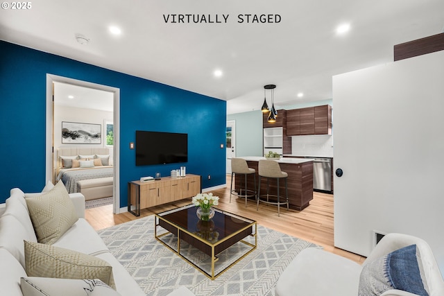 1067 Oak St, Silverton, OR 97381 - living area featuring recessed lighting, light wood-style flooring, and baseboards