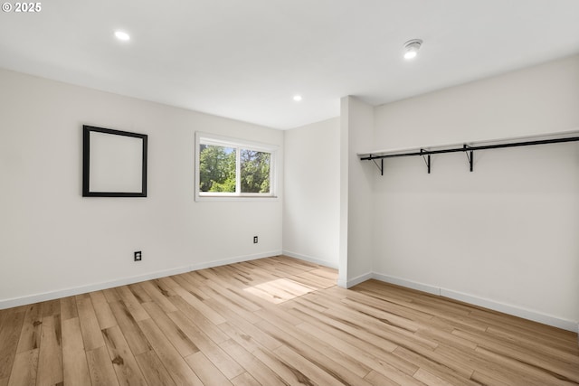 1067 Oak St, Silverton, OR 97381 - unfurnished bedroom with light wood finished floors, baseboards, and recessed lighting