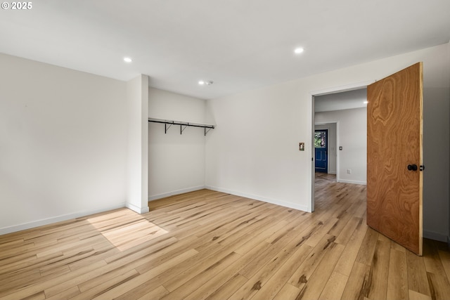 1067 Oak St, Silverton, OR 97381 - unfurnished bedroom featuring light wood-style flooring, recessed lighting, baseboards, and a closet