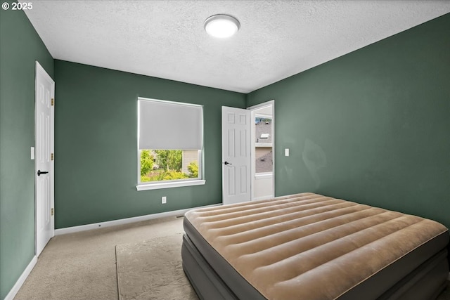 1498 Cathlamet Ct, Salem, OR 97304 - bedroom featuring carpet flooring, baseboards, and a textured ceiling