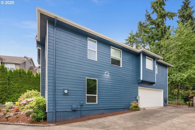 1498 Cathlamet Ct, Salem, OR 97304 - view of property exterior featuring driveway and an attached garage