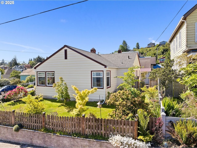 719 6th St, Astoria, OR 97103 - view of side of property with a chimney
