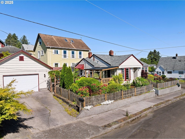719 6th St, Astoria, OR 97103 - view of front of house featuring a garage and driveway
