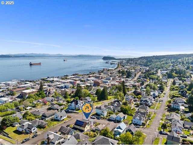 719 6th St, Astoria, OR 97103 - aerial perspective of suburban area with a large body of water