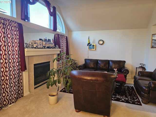 living room with vaulted ceiling and carpet