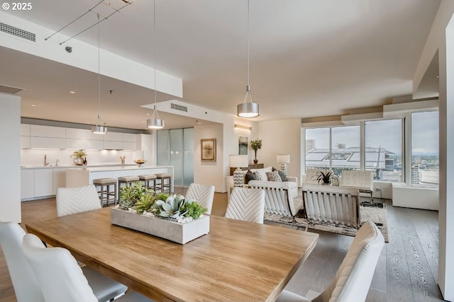 dining area with light wood finished floors