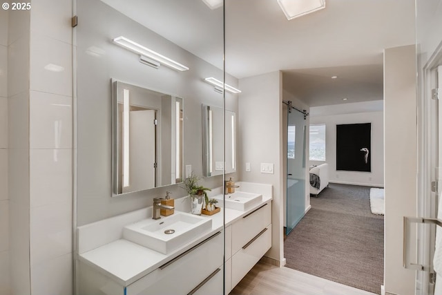 ensuite bathroom featuring double vanity