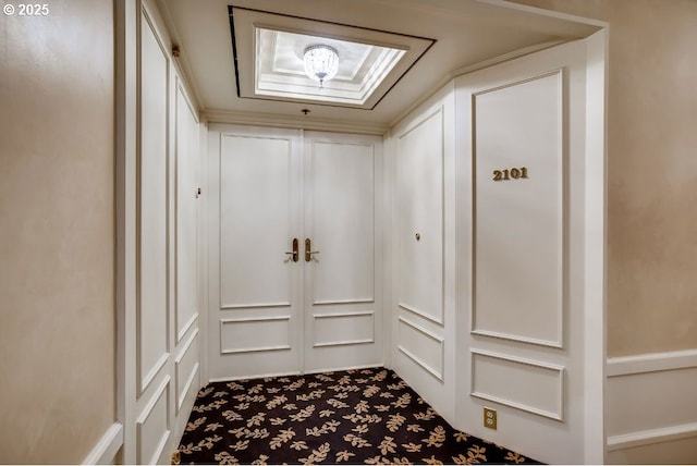 mudroom with carpet flooring