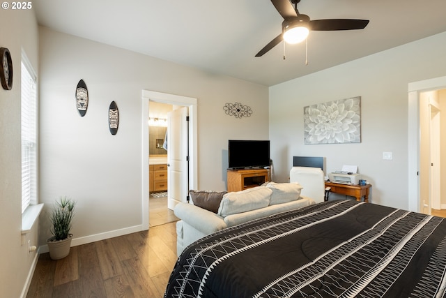 847 Pebble Crk St, Sutherlin, OR 97479 - bedroom featuring wood finished floors, baseboards, ensuite bathroom, ceiling fan, and an office area