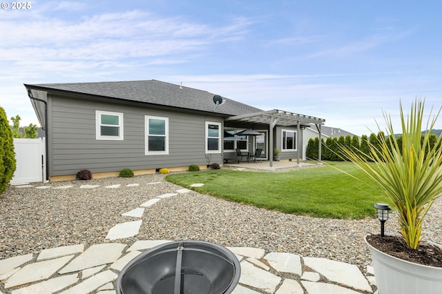 847 Pebble Crk St, Sutherlin, OR 97479 - rear view of property with a pergola, a fire pit, a patio area, and roof with shingles
