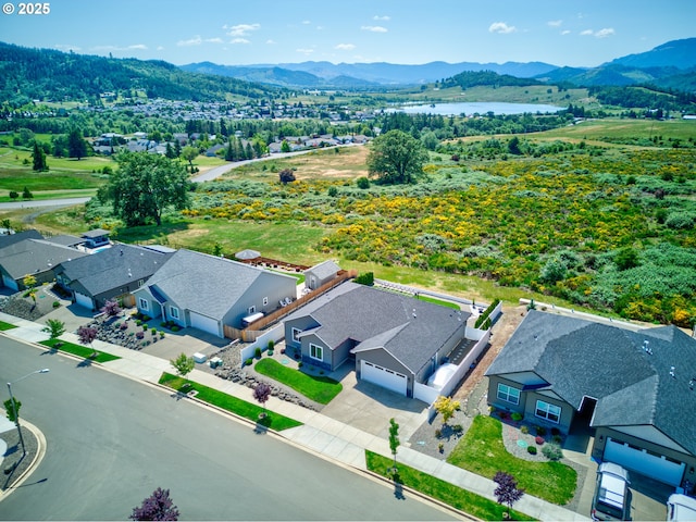 847 Pebble Crk St, Sutherlin, OR 97479 - aerial perspective of suburban area featuring a water and mountain view