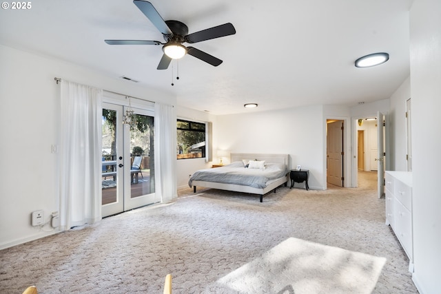 bedroom with light carpet, visible vents, ceiling fan, access to exterior, and french doors