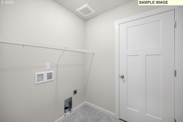 laundry area featuring washer hookup, visible vents, electric dryer hookup, laundry area, and baseboards