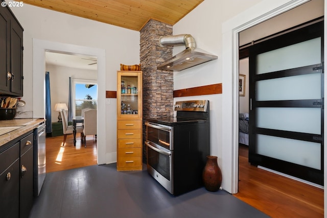 44409 SW Knight Rd, Gaston, OR 97119 - kitchen with appliances with stainless steel finishes, wall chimney exhaust hood, wood finished floors, wooden ceiling, and light countertops