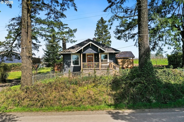 44409 SW Knight Rd, Gaston, OR 97119 - view of front facade featuring a chimney and covered porch
