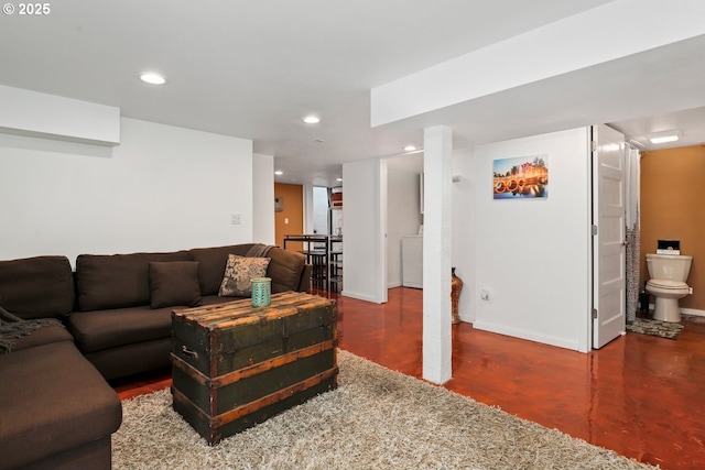 44409 SW Knight Rd, Gaston, OR 97119 - living room with concrete flooring, recessed lighting, baseboards, and washer / clothes dryer