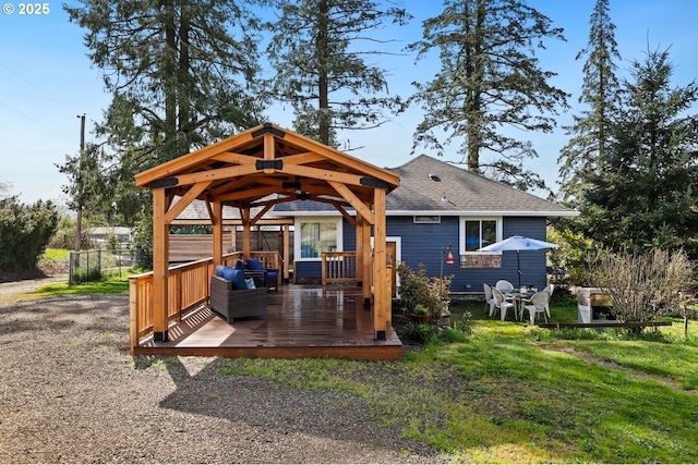 44409 SW Knight Rd, Gaston, OR 97119 - back of property with a gazebo, a deck, a shingled roof, and a yard