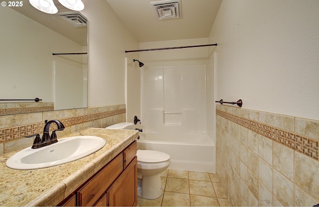 46135 E Avery Rd, Chehalis, WA 98532 - full bath featuring tile walls, toilet, visible vents, and vanity