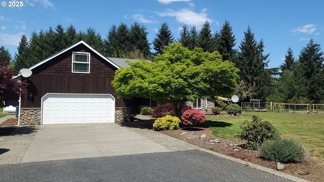 46135 E Avery Rd, Chehalis, WA 98532 - view of front of home featuring concrete driveway, stone siding, and a front yard