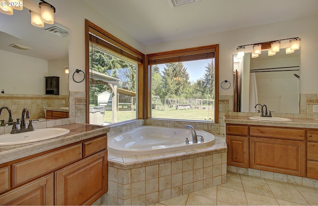 46135 E Avery Rd, Chehalis, WA 98532 - full bath featuring a sink, two vanities, a garden tub, and tile patterned floors