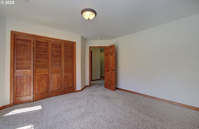 46135 E Avery Rd, Chehalis, WA 98532 - unfurnished bedroom featuring a closet, light carpet, and baseboards