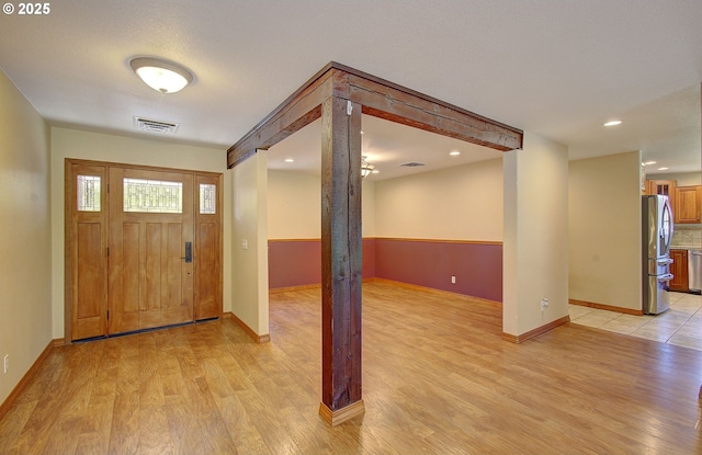 46135 E Avery Rd, Chehalis, WA 98532 - foyer featuring baseboards, light wood-type flooring, and visible vents