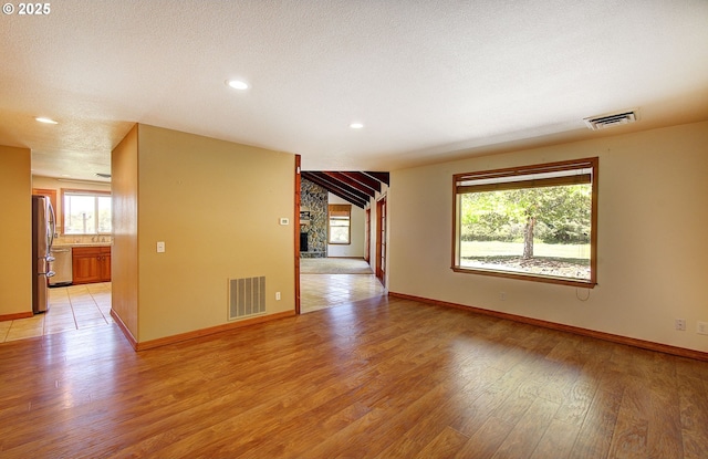 46135 E Avery Rd, Chehalis, WA 98532 - unfurnished room with light wood finished floors, baseboards, and visible vents