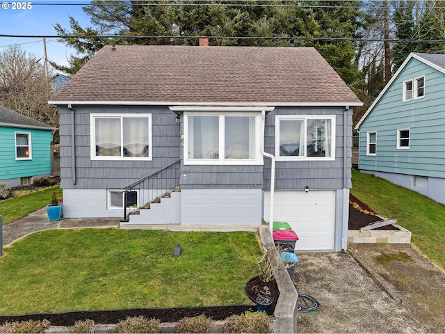 view of front facade featuring a garage and a front yard