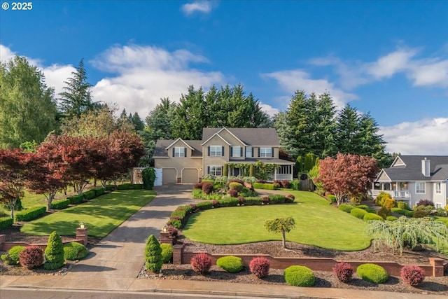980 SW 7th St, Dundee, OR 97115 - view of front of property featuring a garage, a front lawn, and driveway