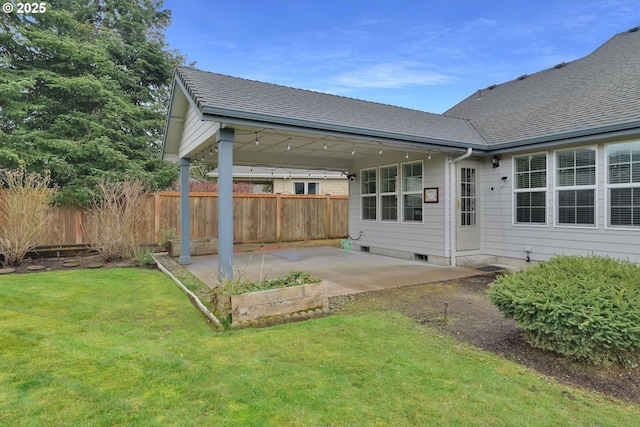 view of yard featuring a patio and fence