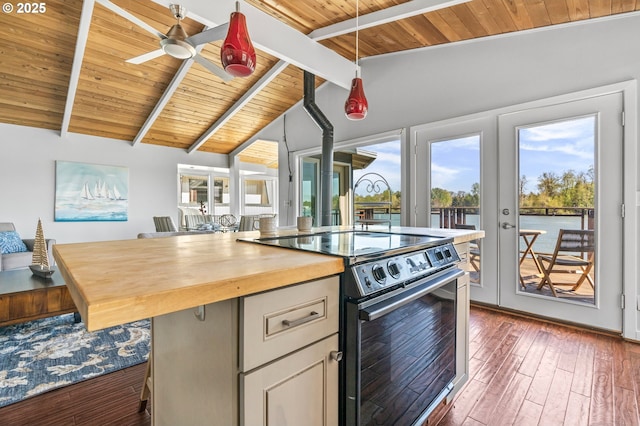 kitchen featuring french doors, electric range oven, a wealth of natural light, and wood ceiling