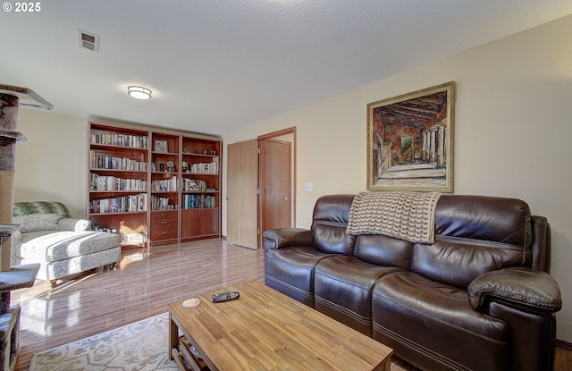 living room with hardwood / wood-style flooring