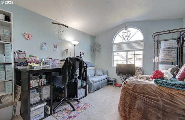 bedroom with vaulted ceiling, carpet floors, a chandelier, and a textured ceiling