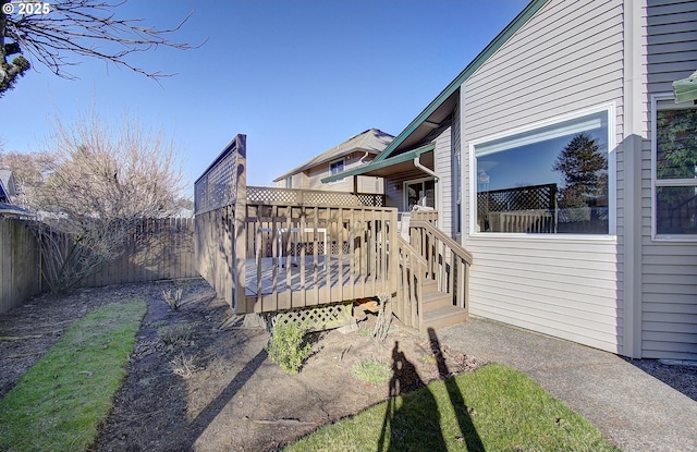 view of yard with a wooden deck