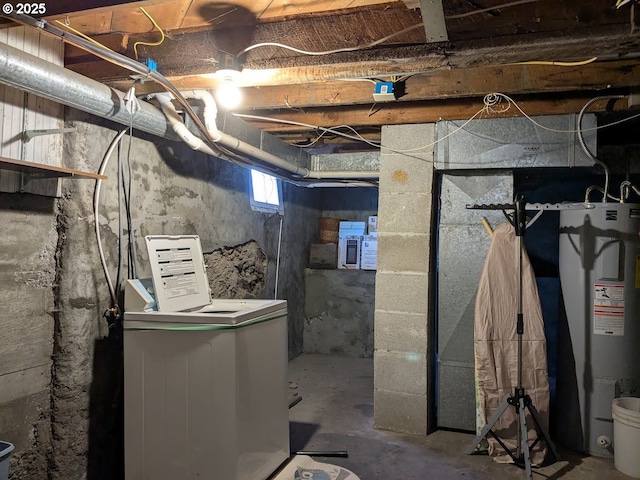 basement with washer / clothes dryer and water heater