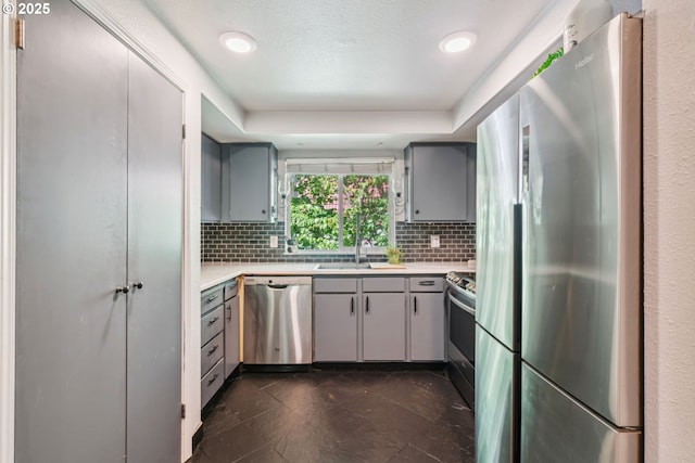 2818 Treetop Ln, West Linn, OR 97068 - kitchen featuring stainless steel appliances, gray cabinets, a sink, and light countertops