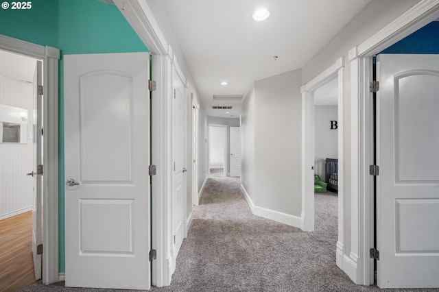 hall featuring visible vents, recessed lighting, baseboards, and carpet