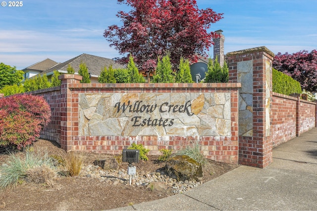 view of community sign