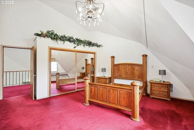 bedroom featuring a chandelier, a closet, dark carpet, and vaulted ceiling