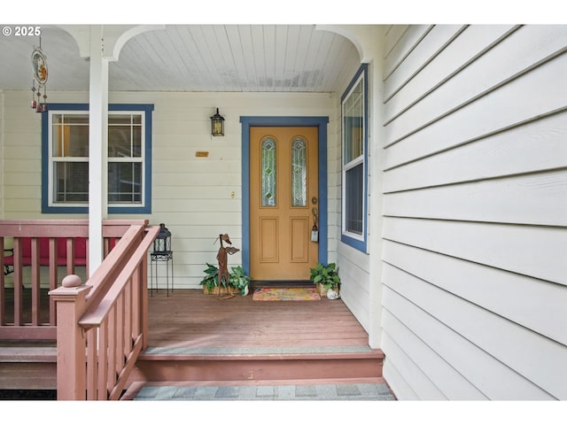 doorway to property featuring a porch