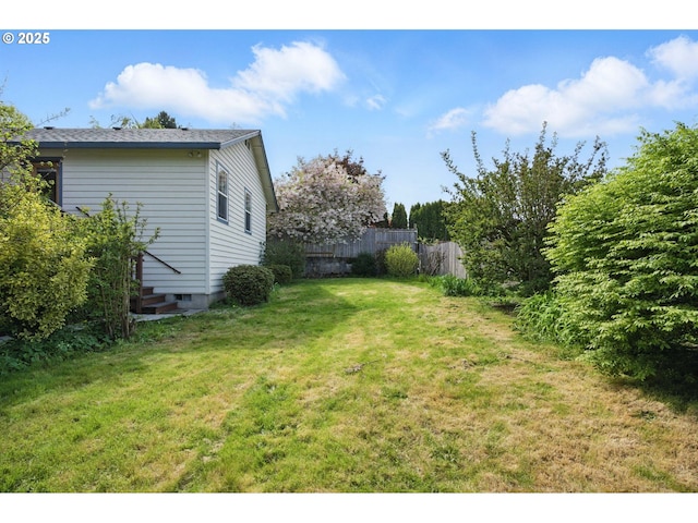 view of yard with fence