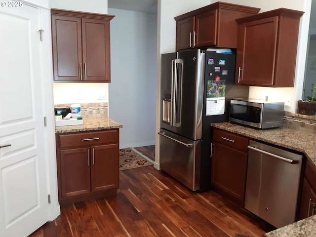 3625 Snowberry Rd, Eugene, OR 97403 - kitchen featuring stainless steel appliances, dark wood-style flooring, and light stone countertops