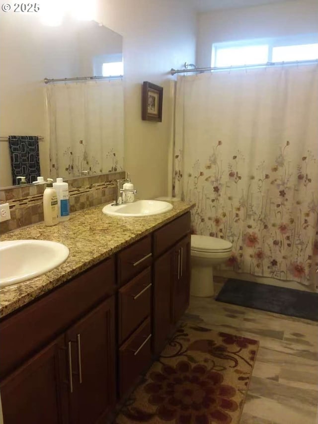 3625 Snowberry Rd, Eugene, OR 97403 - bathroom featuring double vanity and curtained shower