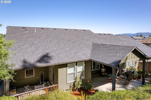 3625 Snowberry Rd, Eugene, OR 97403 - rear view of property featuring a patio area, roof with shingles, and a mountain view
